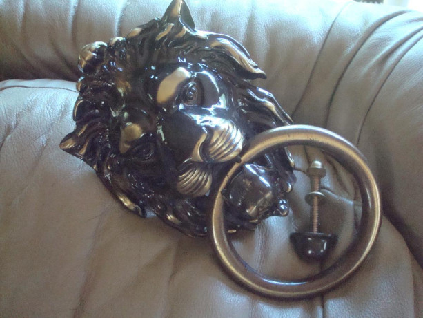 brass-lion-head-door-knocker-big-0